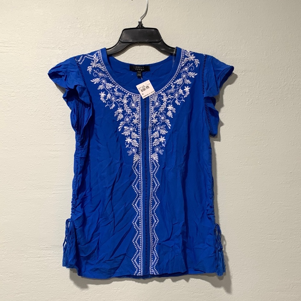 Womens blue blouse with floral designs